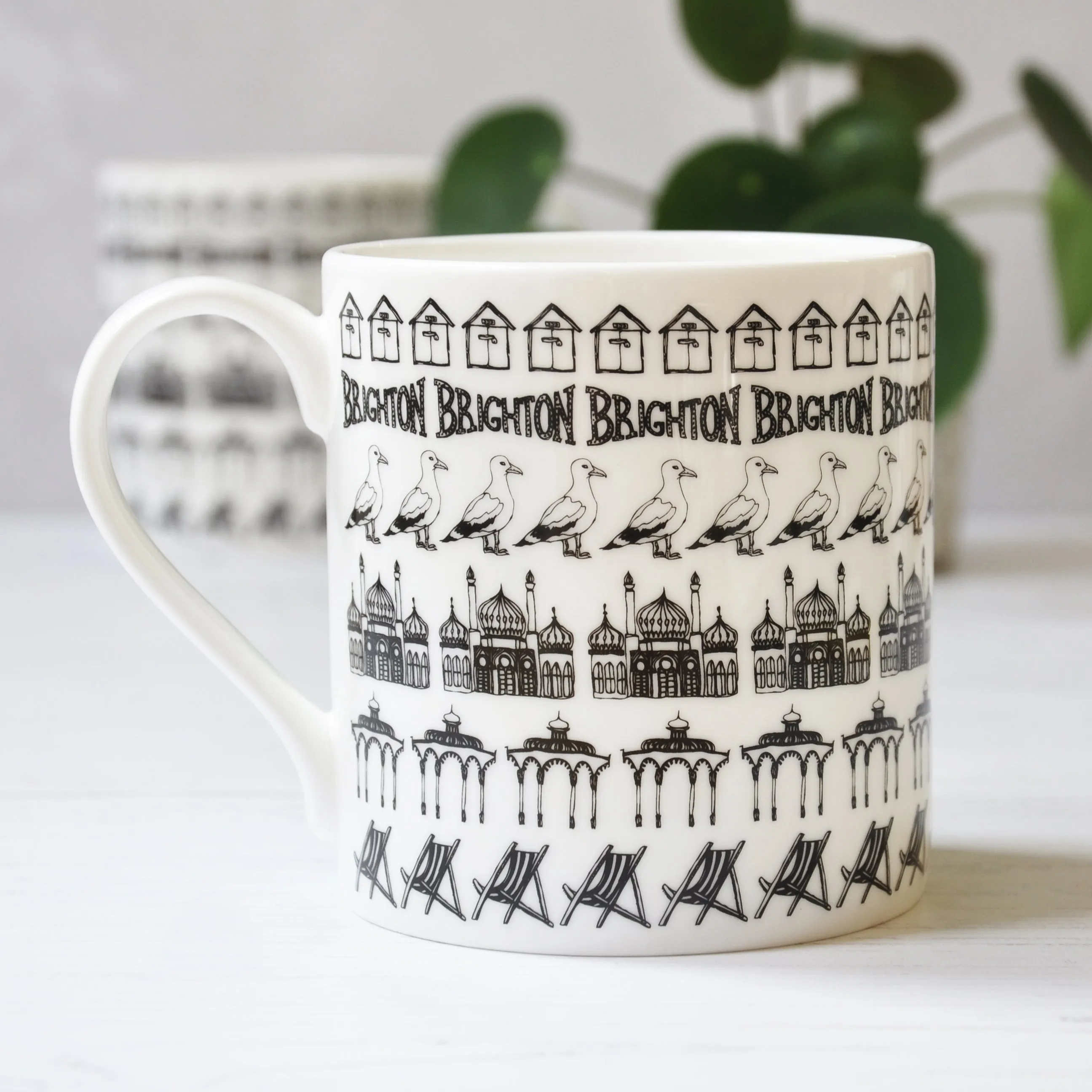 Brighton beach huts illustrated black and white mug