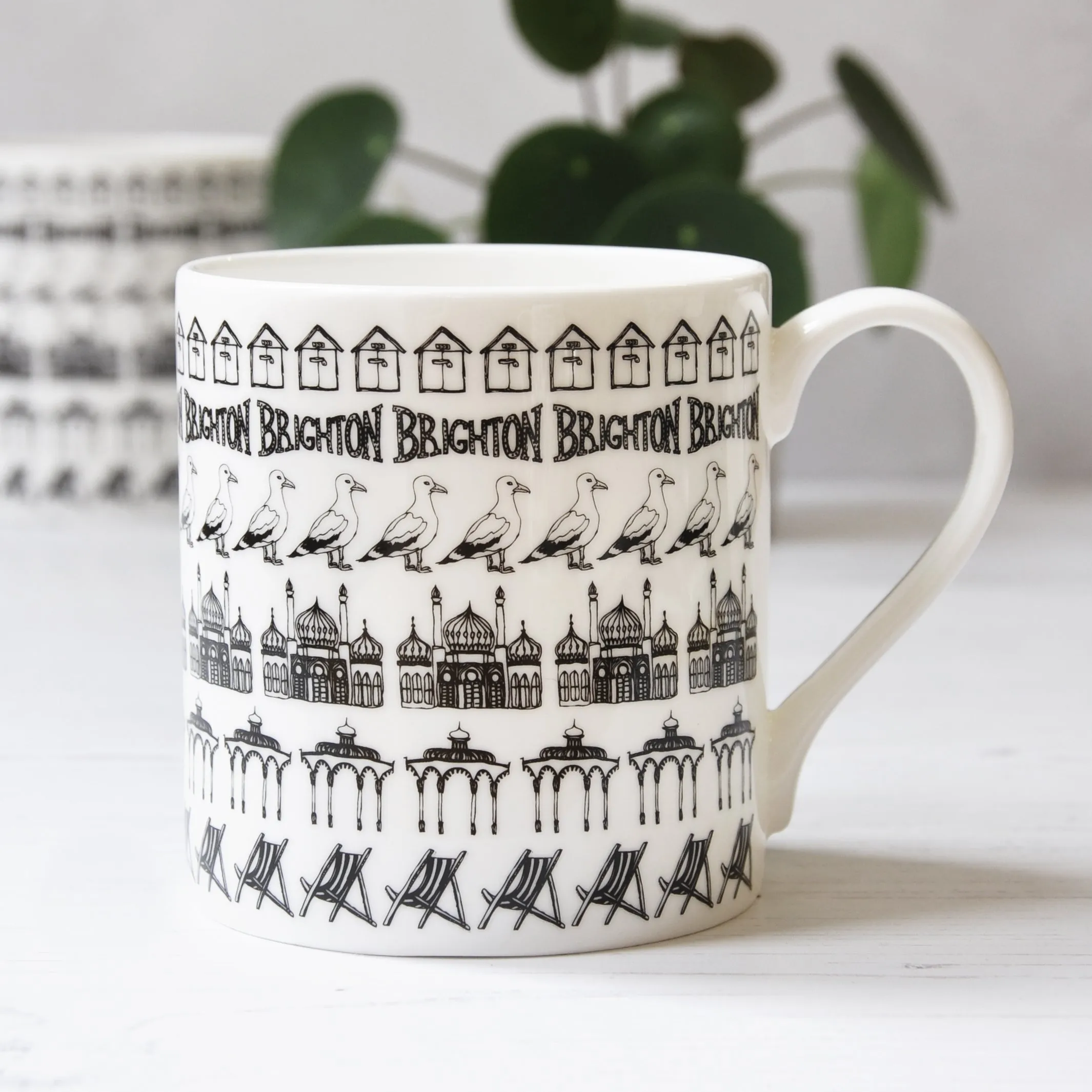 Brighton beach huts illustrated black and white mug