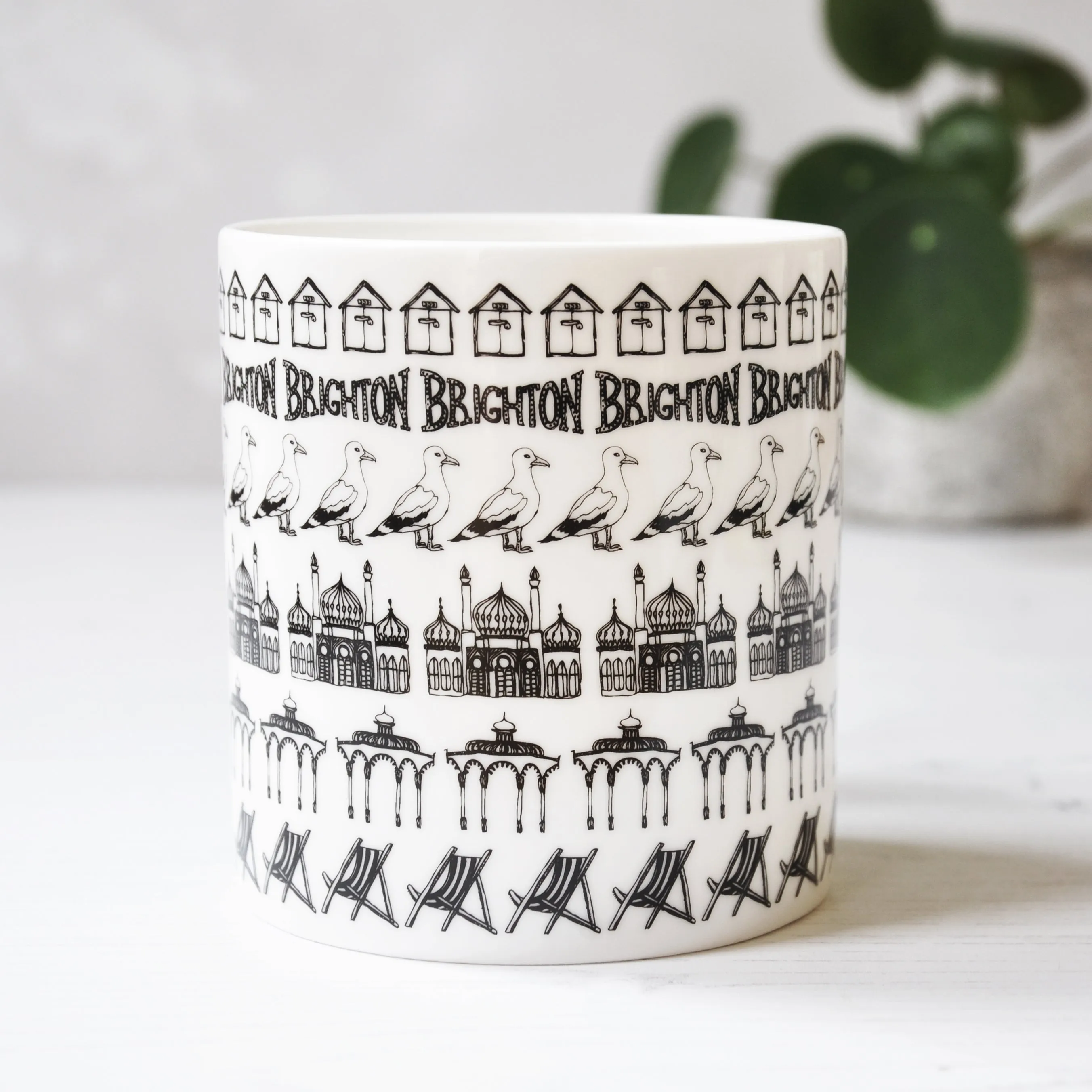 Brighton beach huts illustrated black and white mug