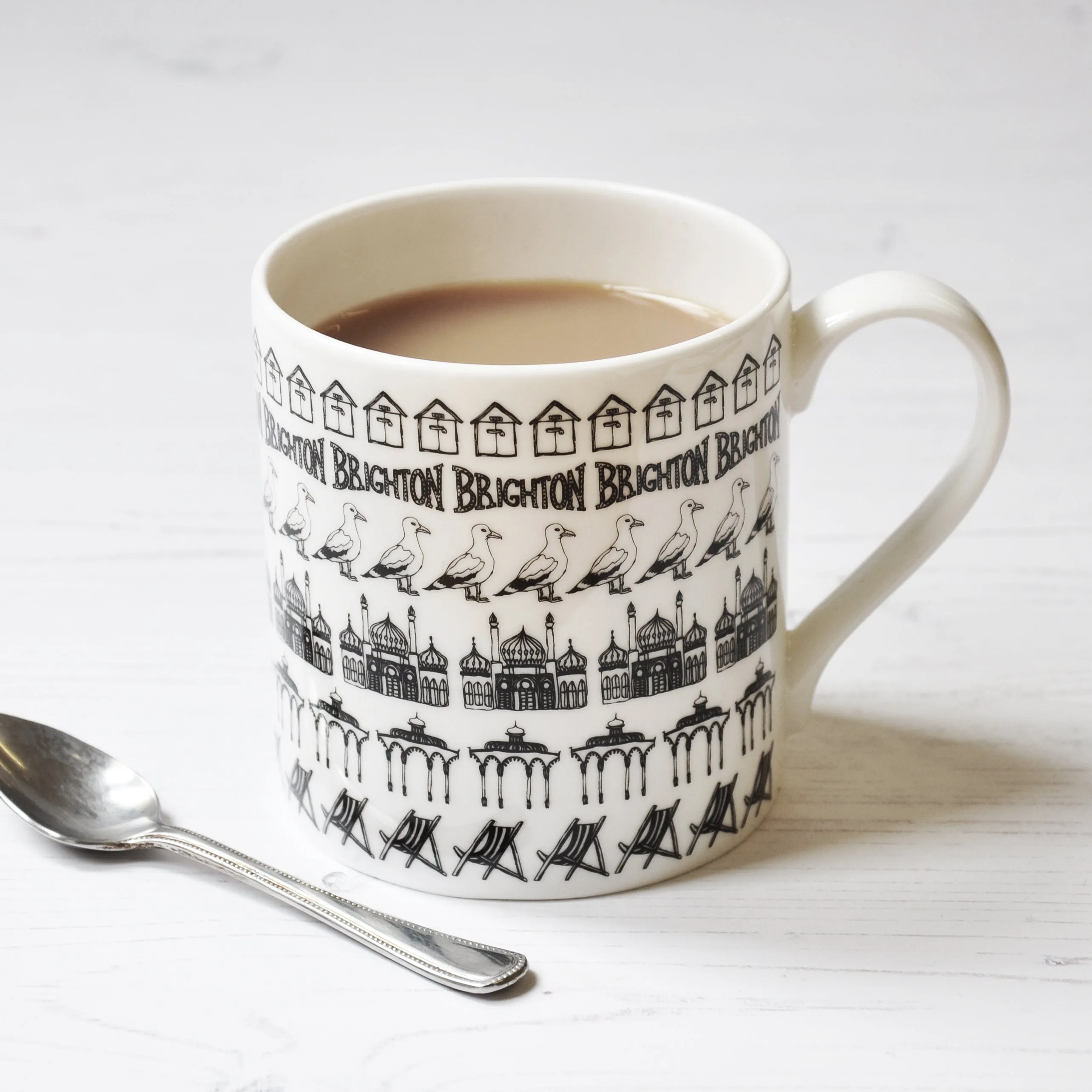 Brighton beach huts illustrated black and white mug